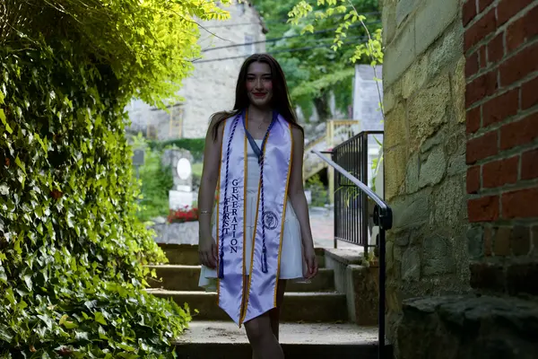 First-generation graduate — ivy walkway portrait