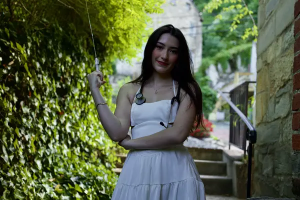 Graduation portrait — stethoscope ivy