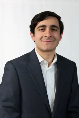 Professional headshot — navy suit portrait