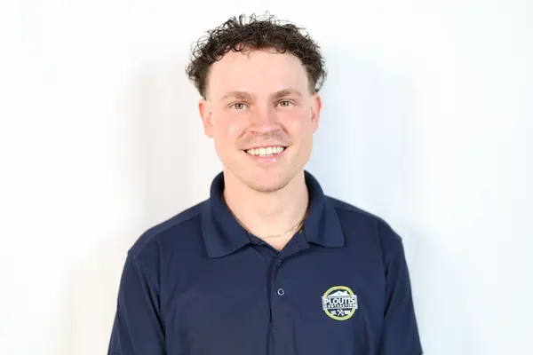 Professional headshot — polo portrait